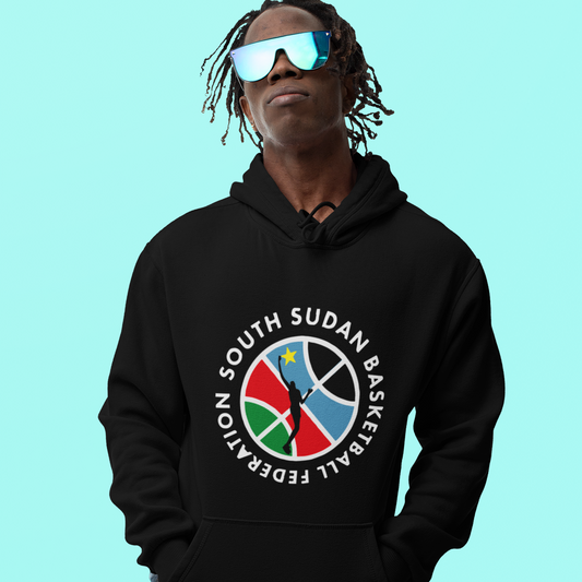Person wearing a black hoodie with a South Sudan Basketball Federation logo on a light blue background